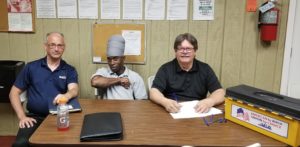Case's Pork Roll Negotiating Committee: Union Representative Jerry Chudoff, Shop Steward James Grant, and Director of Collective Bargaining Larry Lucente.