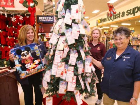 Nancy Riess and coworkers in front of the Giving Tree (2011)