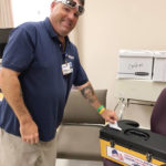 A UFCW Local 152 member voting at Bacharach's ratification meeting.