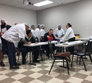 Members of TQ Baking learning what the contract is about.