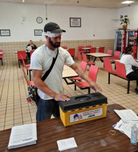 A member voting at the Hanover Foods ratification meeting on 6/17/2020.