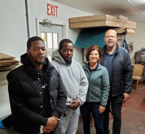 The Negotiating Committee: Committeeperson Vincent Freeman, Chief Shop Steward Fred Drayton, Assistant Director of Collective Bargaining Lisa Sanders, and Union Representative Greg Torian.