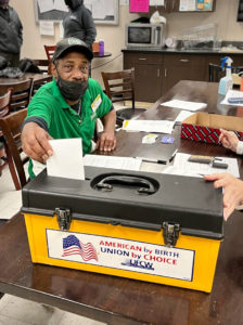 A member casting his vote, 2/2/2022.