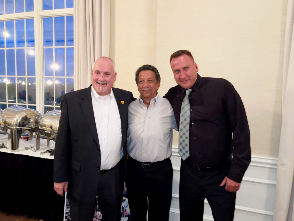 Dan Konczyk, Anthony Benigno, and President Brian String at Anthony's retirement.