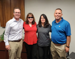 Part of the negotiating committee for Bacharach Rehabilitation. From left to right: Union Representative Chad Brooks, workers Tania Simpson and Debbie Daniels, and Union Representative Peter White.