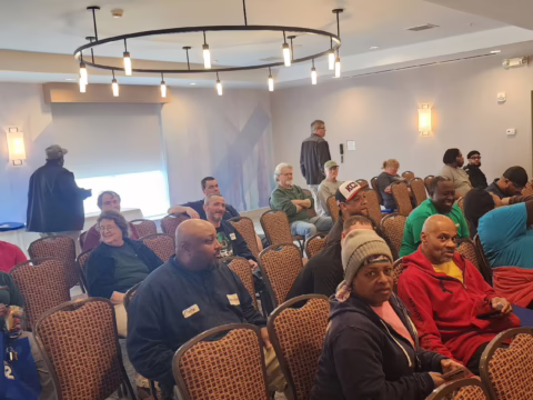 Workers at the Kraft Heinz proposal meeting, 2025.