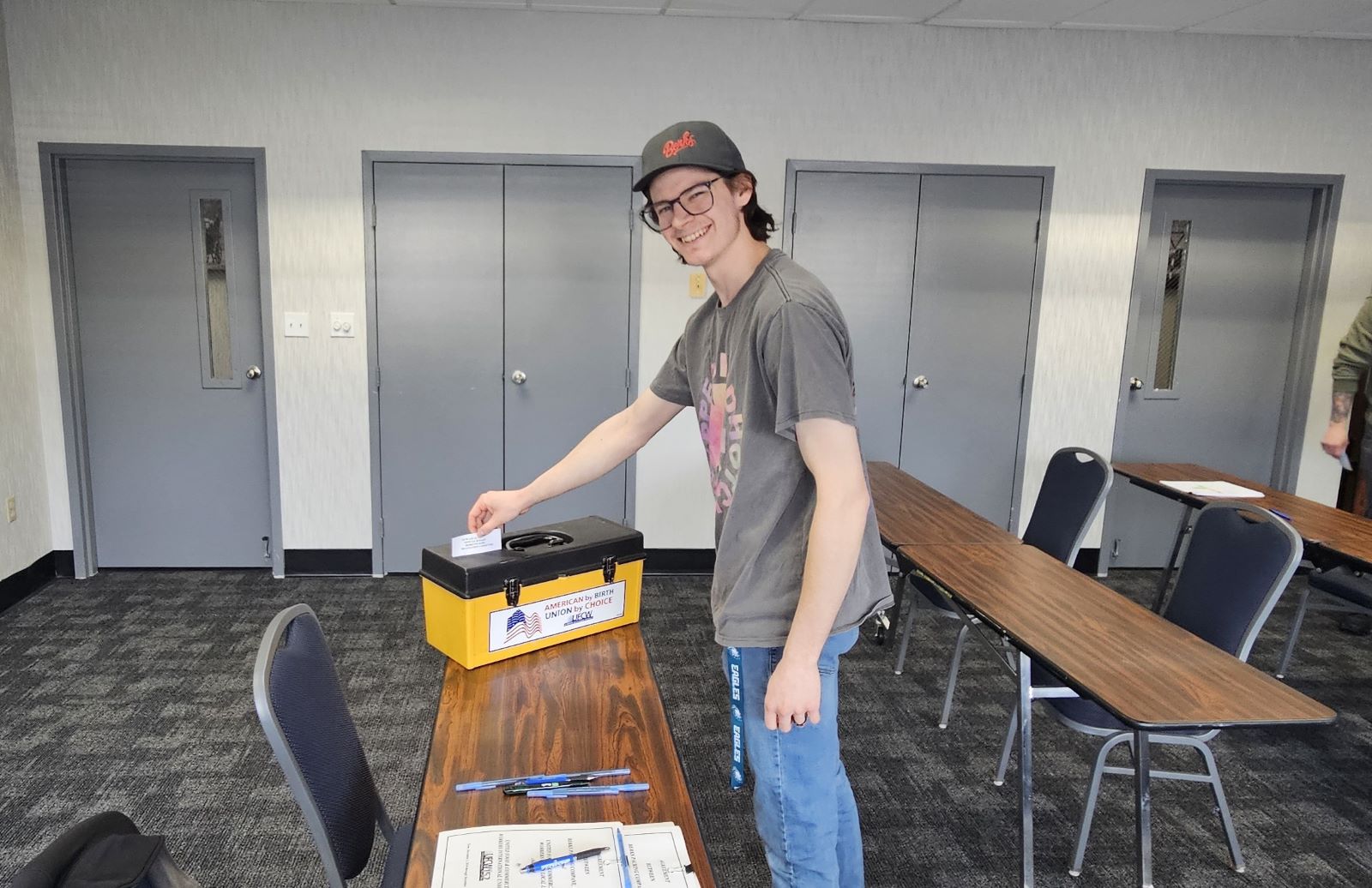 A worker at Berks voting.
